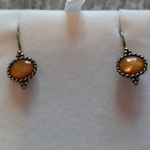 Gold tone and brown dangly earrings
